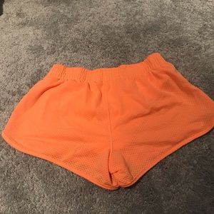 NWOT Under Armour semi fitted heat gear shorts S